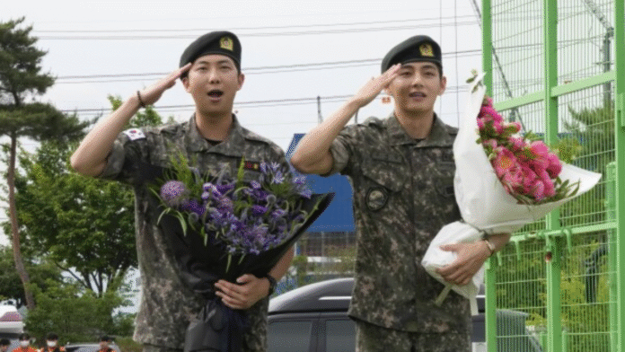 BTS members RM and V in military uniform