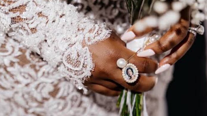 Photo of late Ifeanyi Adeleke sighted in Chioma wedding bouquet