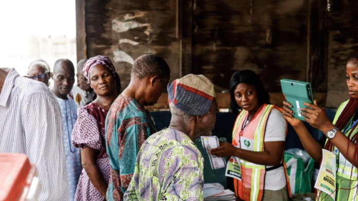 People queuing to vote