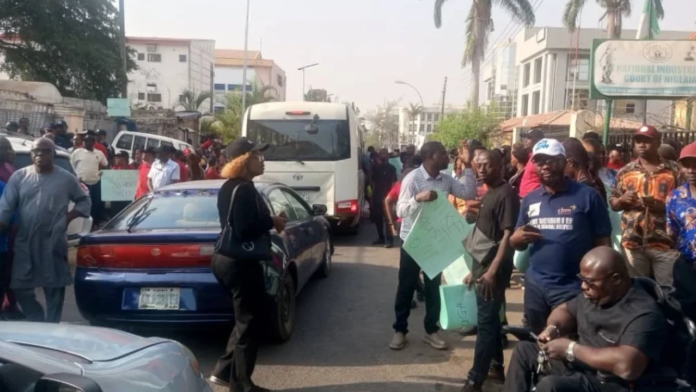 FCTA workers protesting at the National Industrial Court in Abuja