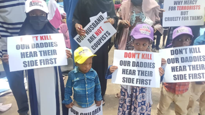 Families of detained soldiers protest at NASS, demand trial